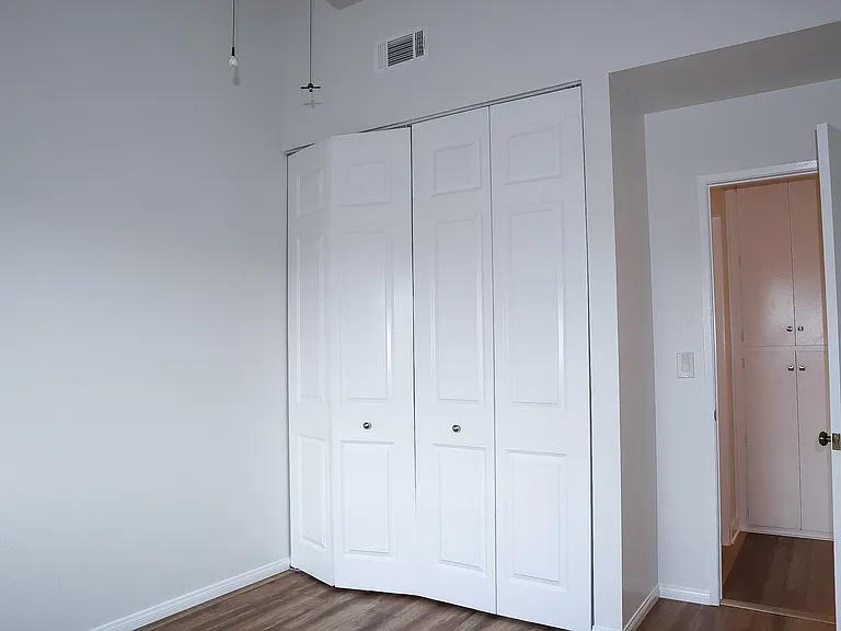 Bedroom #2 with vaulted ceilings.