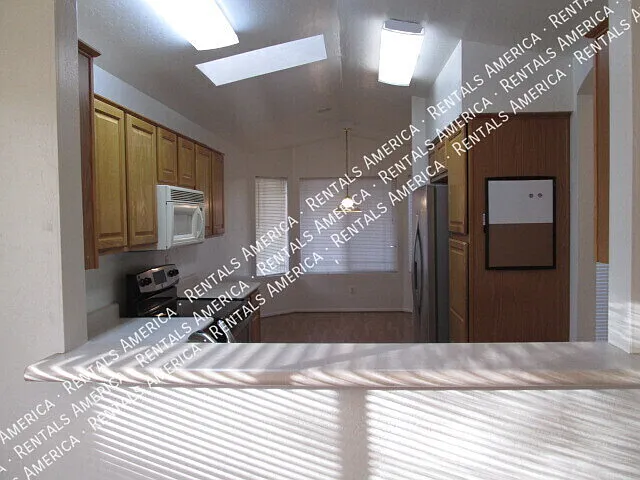 10845 E Dragoon Ave — Photo 4