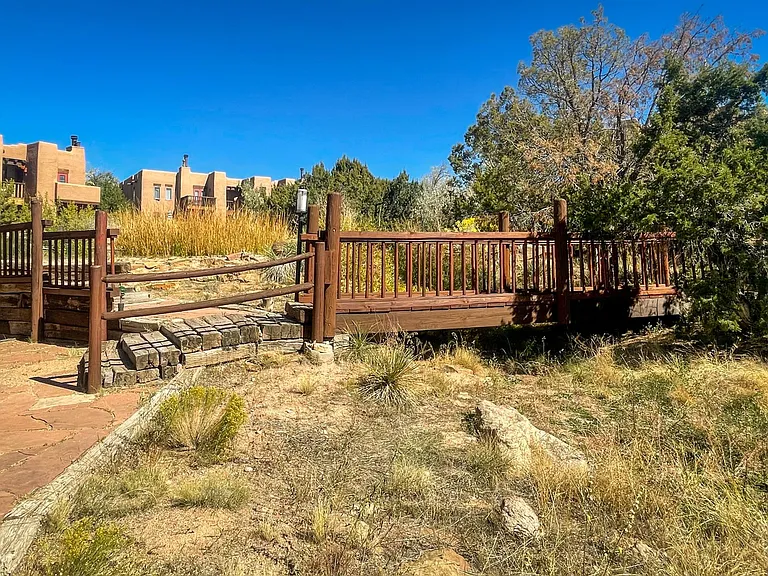 Bridges and trails converge before second pond