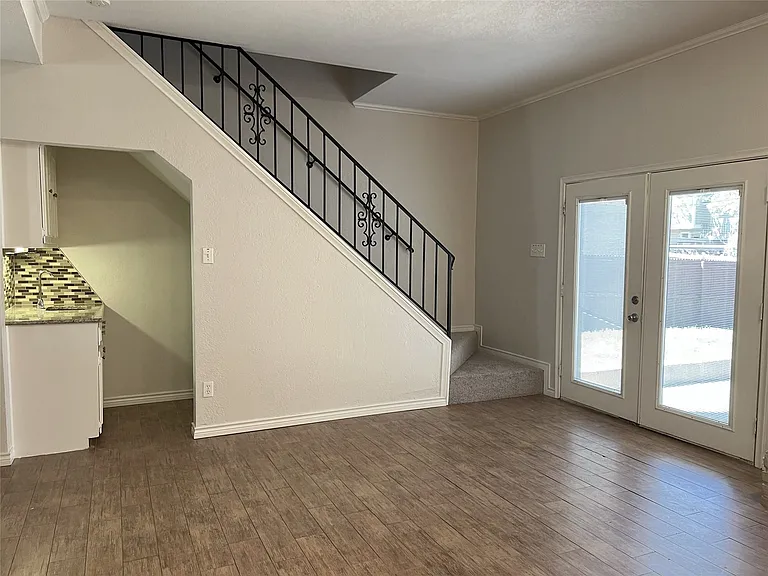 Wet bar and storage under the stairs.