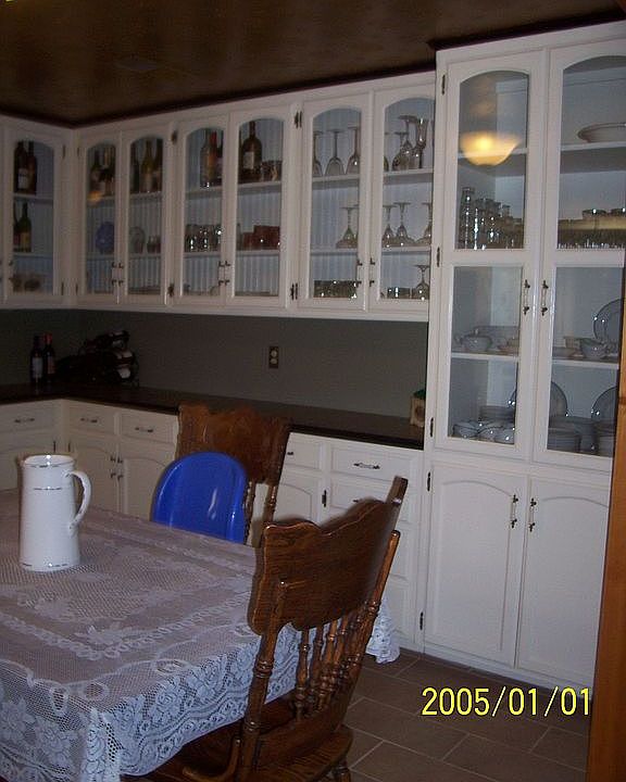 Breakfast nook with beautiful display cabinetry
