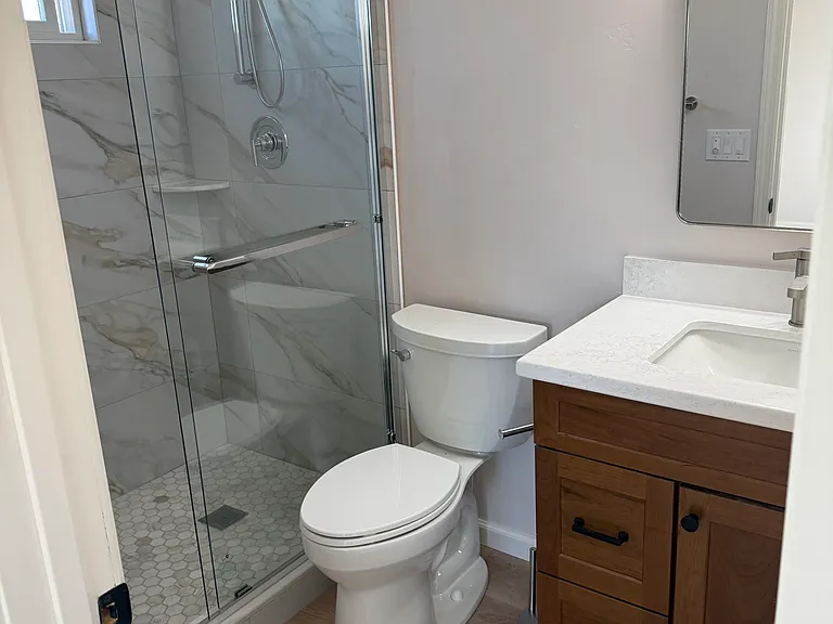Primary bedroom en-suite bathroom with shower
