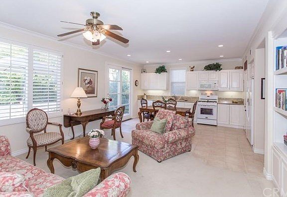 Open concept great room encompasses kitchen, dining and entertainment areas.