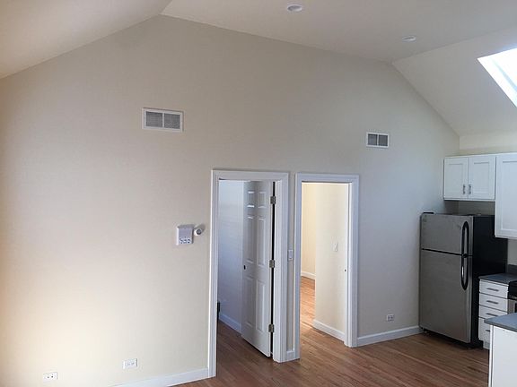 Living room with vaulted ceiling