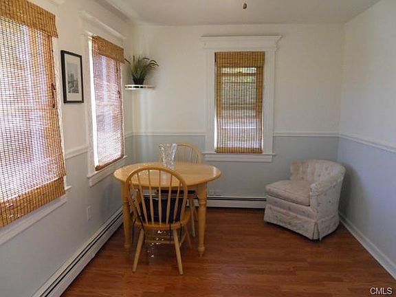 Cozy front room for dining or entry foyer