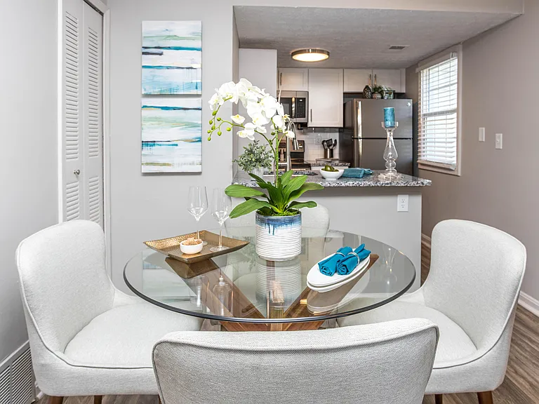 Dining area with hardwood-style flooring