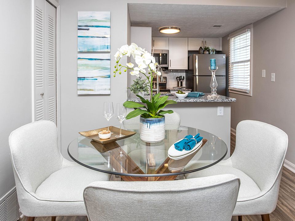Dining area with hardwood-style flooring