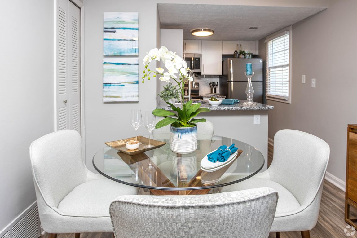 Dining area with hardwood-style flooring