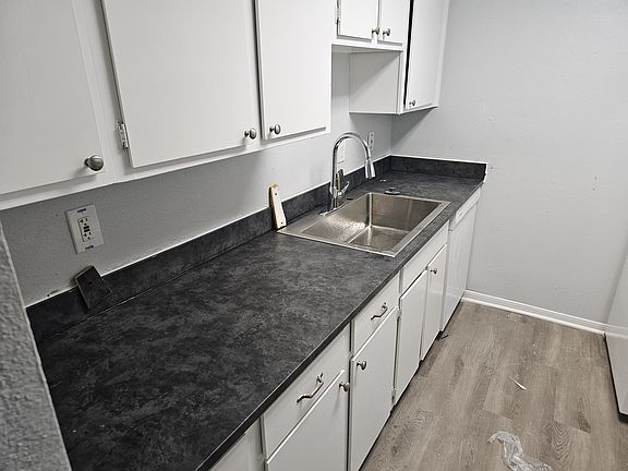 New appliances, sink, counter tops, facuet and fresh paint
