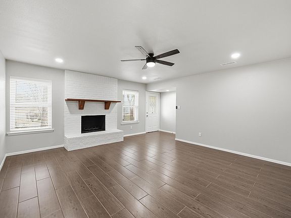 Wood-like tile throughout the entire home