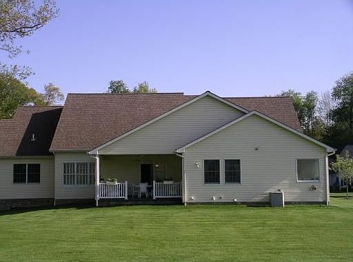 Exterior Back: Rear view with covered porch