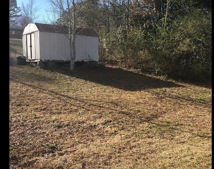 Extra storage shed in backyard