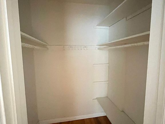 Walk in closet in bedroom.