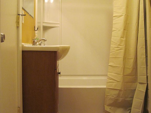 Bathroom with walk in closet