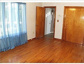 The dining room can also be used as a den or toy room. 
