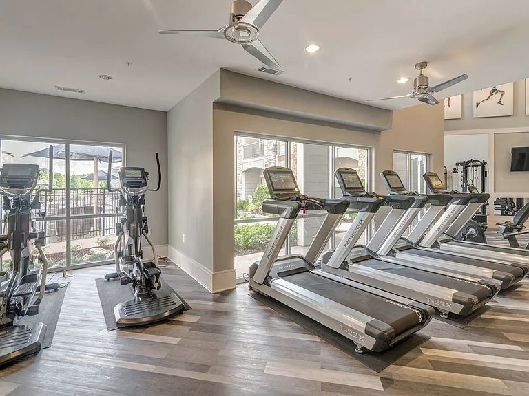 State-of-the-art fitness center with cardio equipment