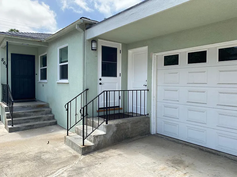 Entrance to 861 with garage.