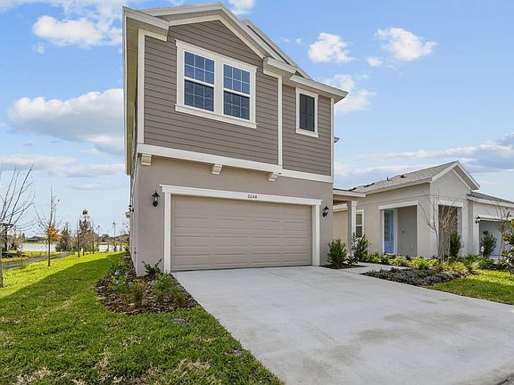 Sebring new construction quick move-in home 6644 Great Bear Dr. left front angled view at BridgeWate