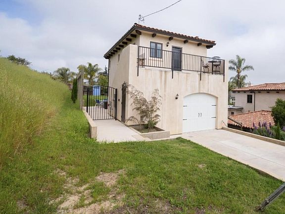 entire building of ADU and driveway (space for 2 cars, garage door inoperable)