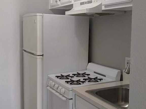 Refrigerator and stove included!