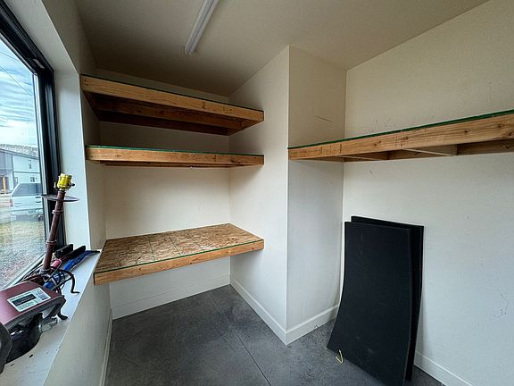 Walk-in storage area for gear.