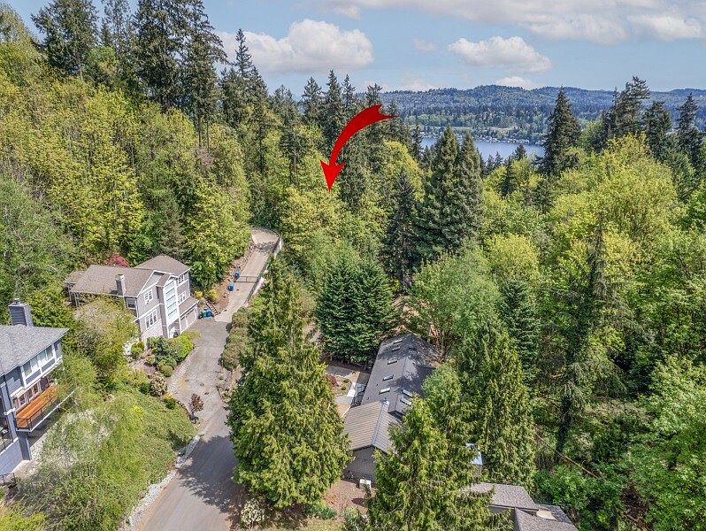 Nestled among lush trees and tranquil waters, find your sanctuary on Mercer Island - where nature meets luxury living.