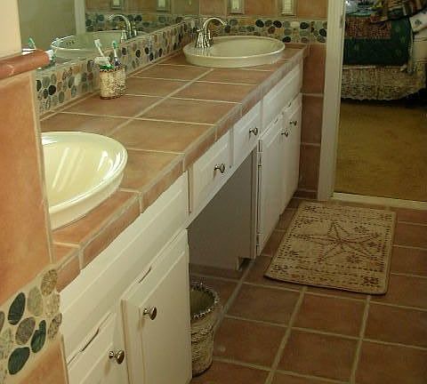 Updated tile & Sinks, master bath
