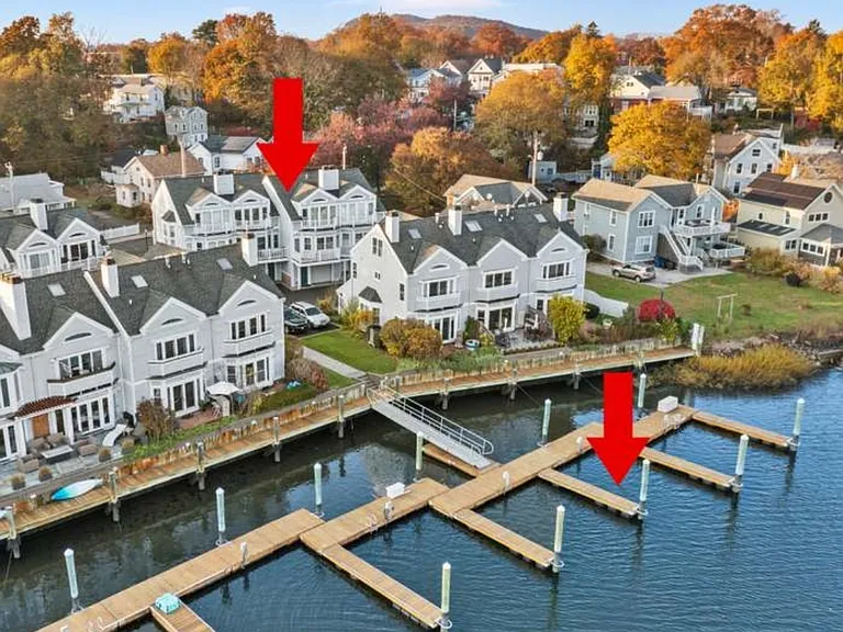 Stunning waterfront condo with private boat slip and marina access.
