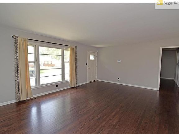 Living room offers a multitude of furniture layouts. Did you know Google Fiber is already installed for you?