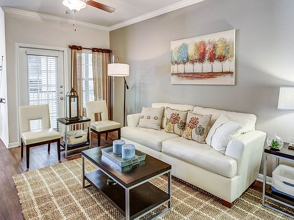 Living room with access to outdoor patio