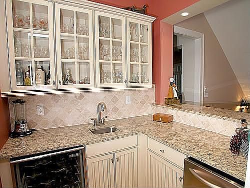 Bar located next to kitchen