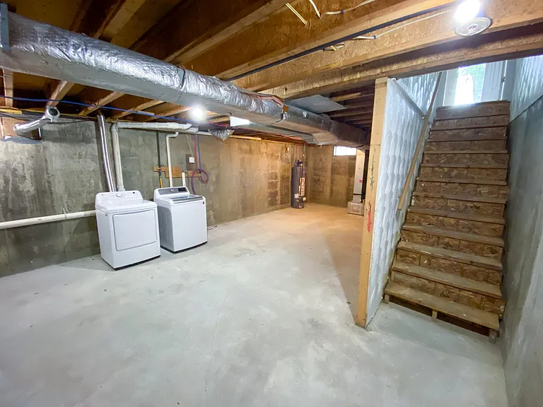 The spacious basement includes a washer and dryer.