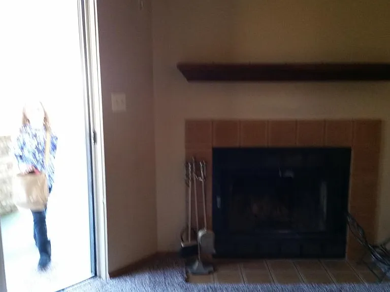 Fireplace and patio (or balcony in second floor apartment)