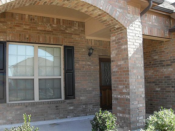 This covered front porch will allow you many decorative opportunities