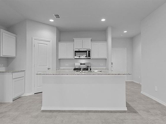 Kitchen - All Home and community information, including pricing, included features, terms, availability and amenities, are subject to change at any time without notice or obligation. All Drawings, pictures, photographs, video, square footages, floor plans, elevations, features, colors and sizes are approximate for illustration purposes only and will vary from the homes as built.