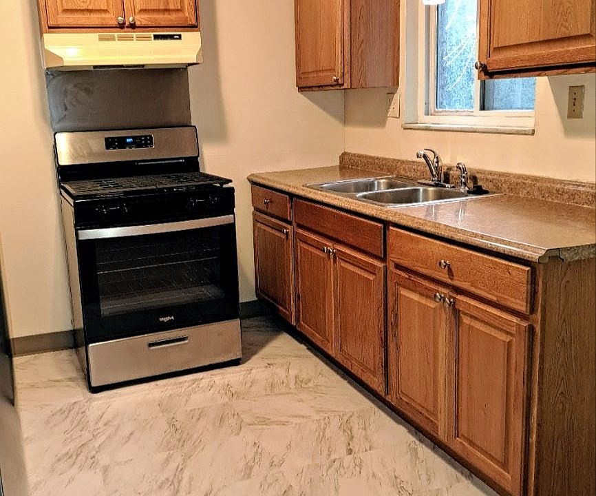 Bright kitchen with large upgraded appliances