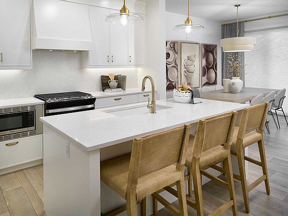 A photo of the kitchen of the Purcell 24 show home in Rockland Park by Brookfield Residential