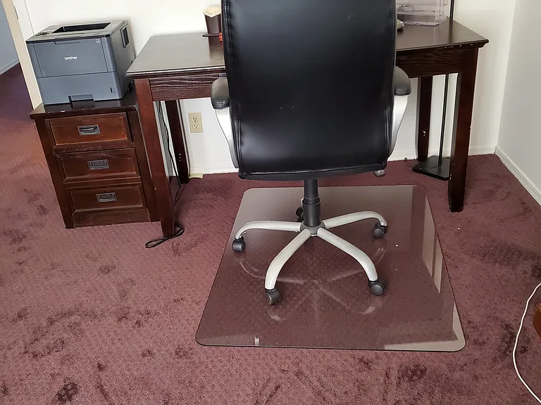like new leather office chair, desk, file cabinet, newer carpeting, more...