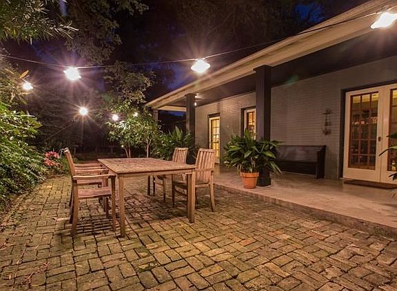 Interested in hosting a quaint gathering in your amazing private courtyard? Porch could actually be screened in at some point for a low cost.