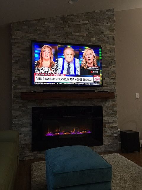 Custom wall tv and firepalce