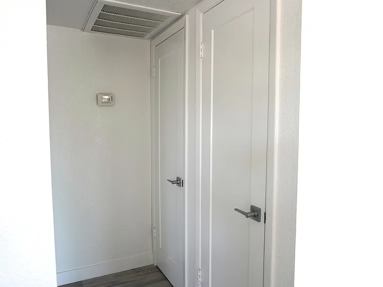 2 hallway closets. Linen closet and guest coat closet.