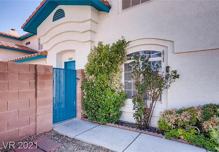 Gate to front door and courtyard