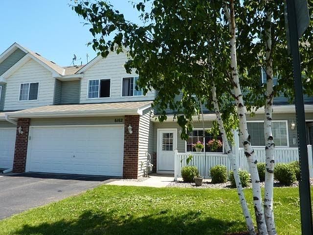 Front of home - 2nd to end unit by grassy area and pond