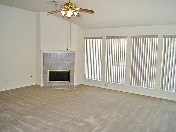 HUGE DEN WITH CORNER GAS LOG FIREPLACE