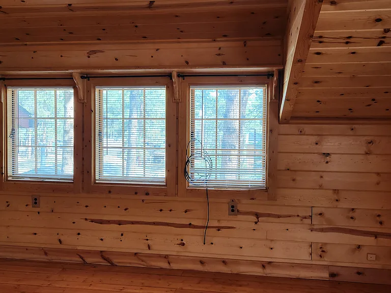 All the upstairs windows have blinds as well as curtain rods if you wish to have curtains as well.
