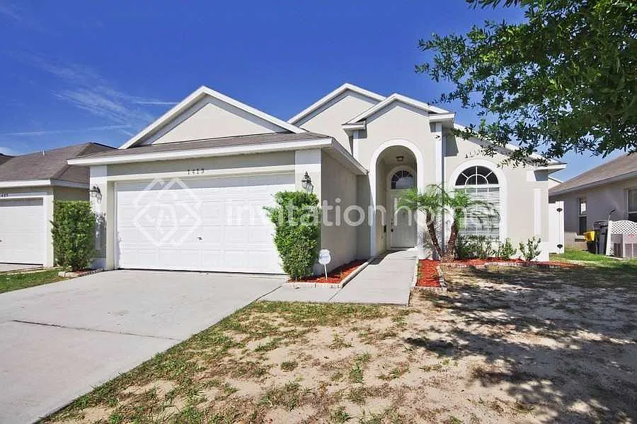 1419 Belvoir Dr Davenport, FL 33837 — Photo 1