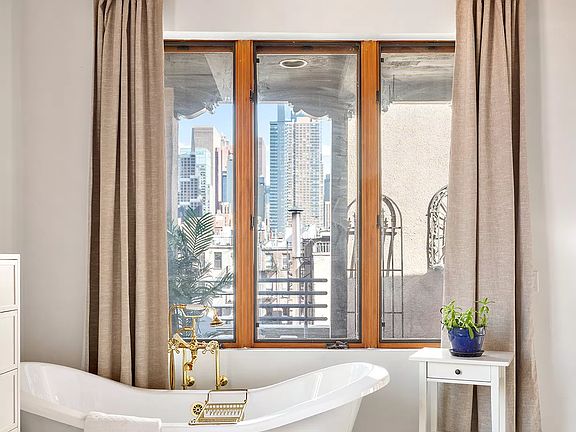 5th image of 521 W 47th St Penthouse B