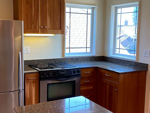Spacious kitchen with stainless steel appliances