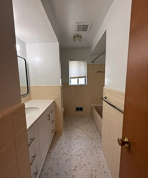8609 Potomac Ave — Photo 10