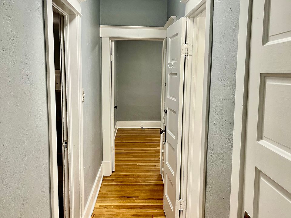 Hallway between bedrooms and bathroom